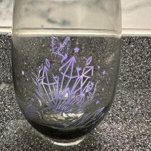 Glass wine quartz and a hand